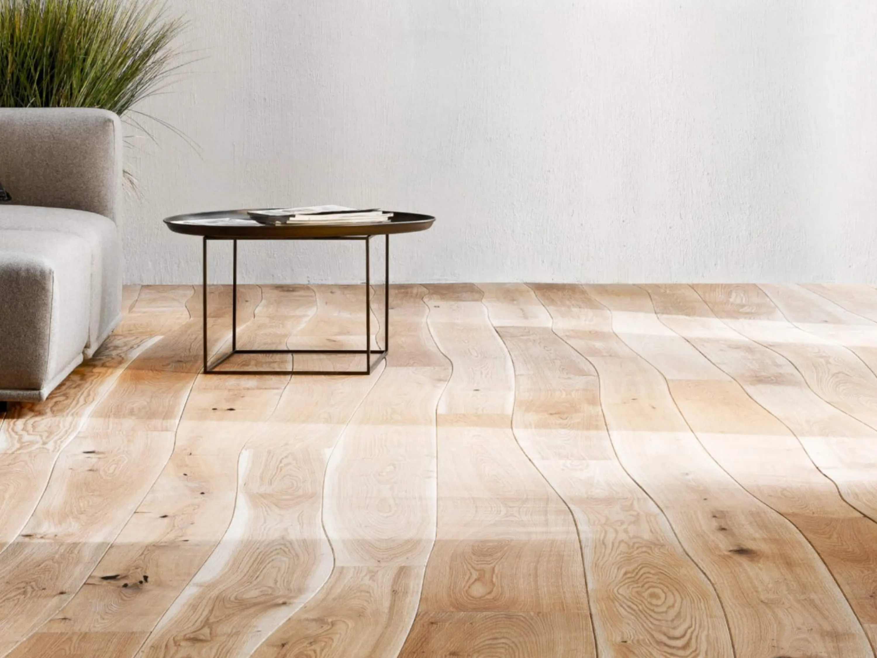 Wooden flooring with a curved organic profile.