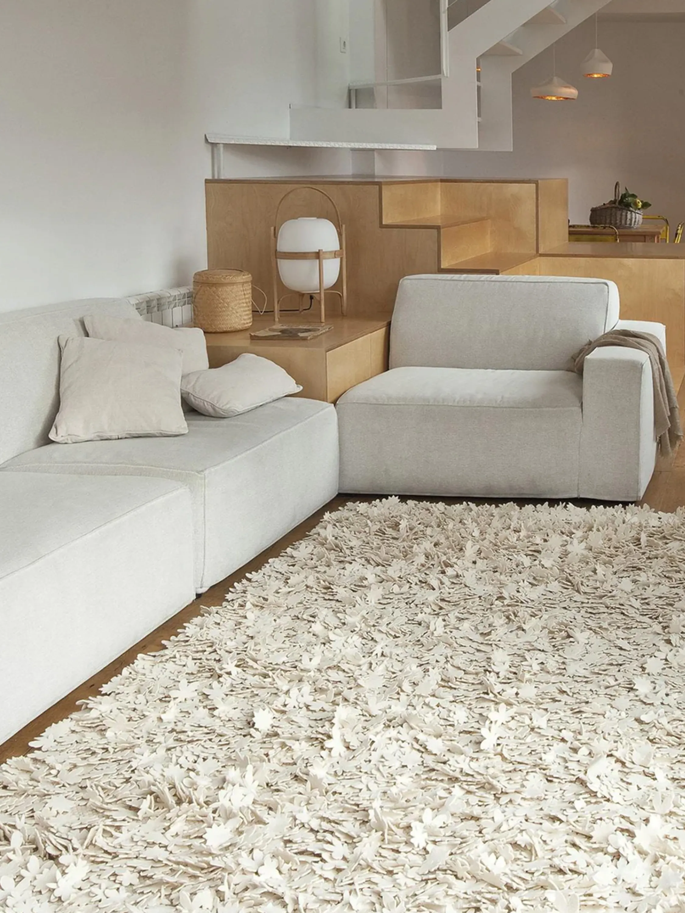A textured rug made of tiny petals.