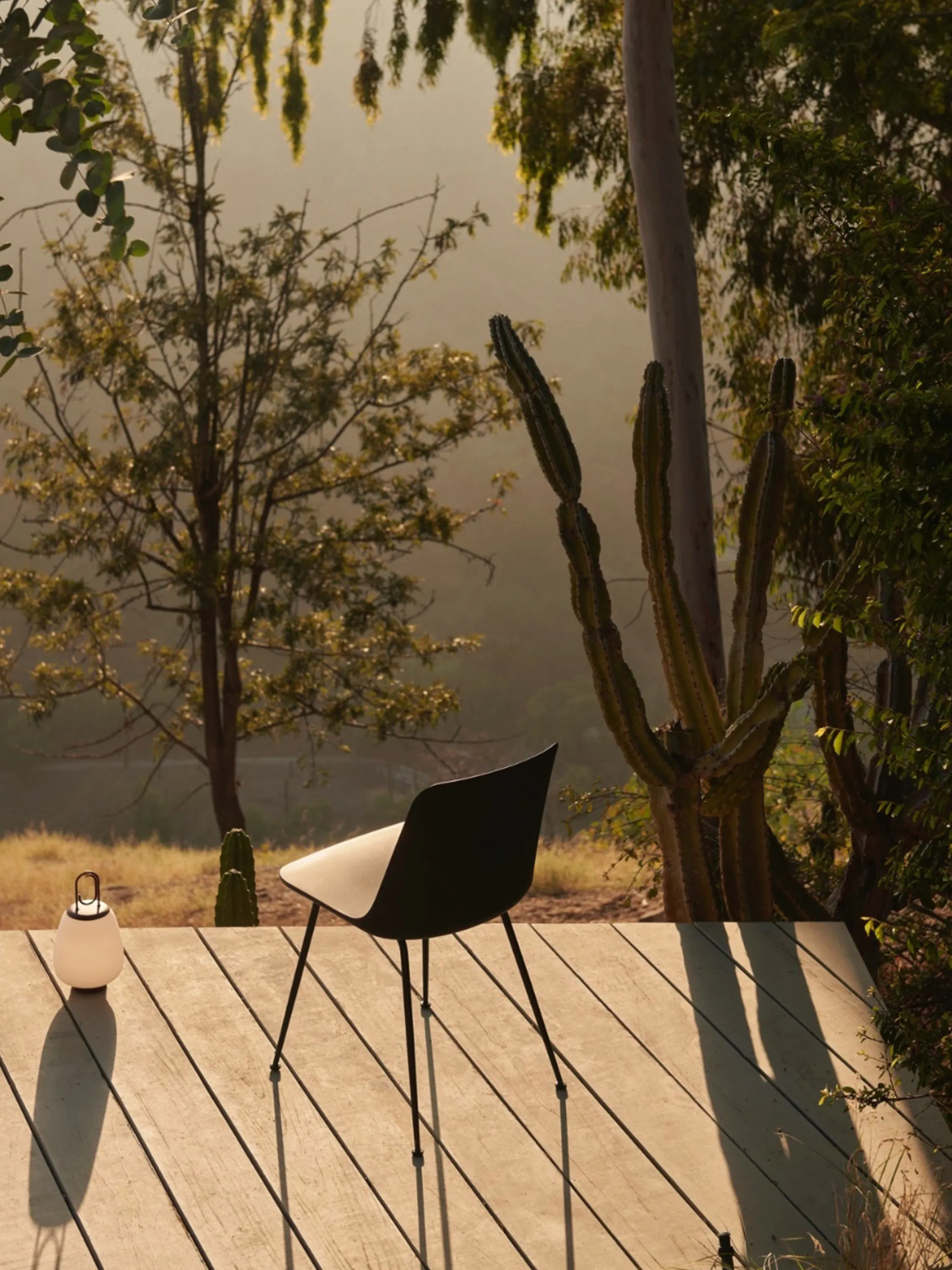 Outdoor deck overlooking a body of water.