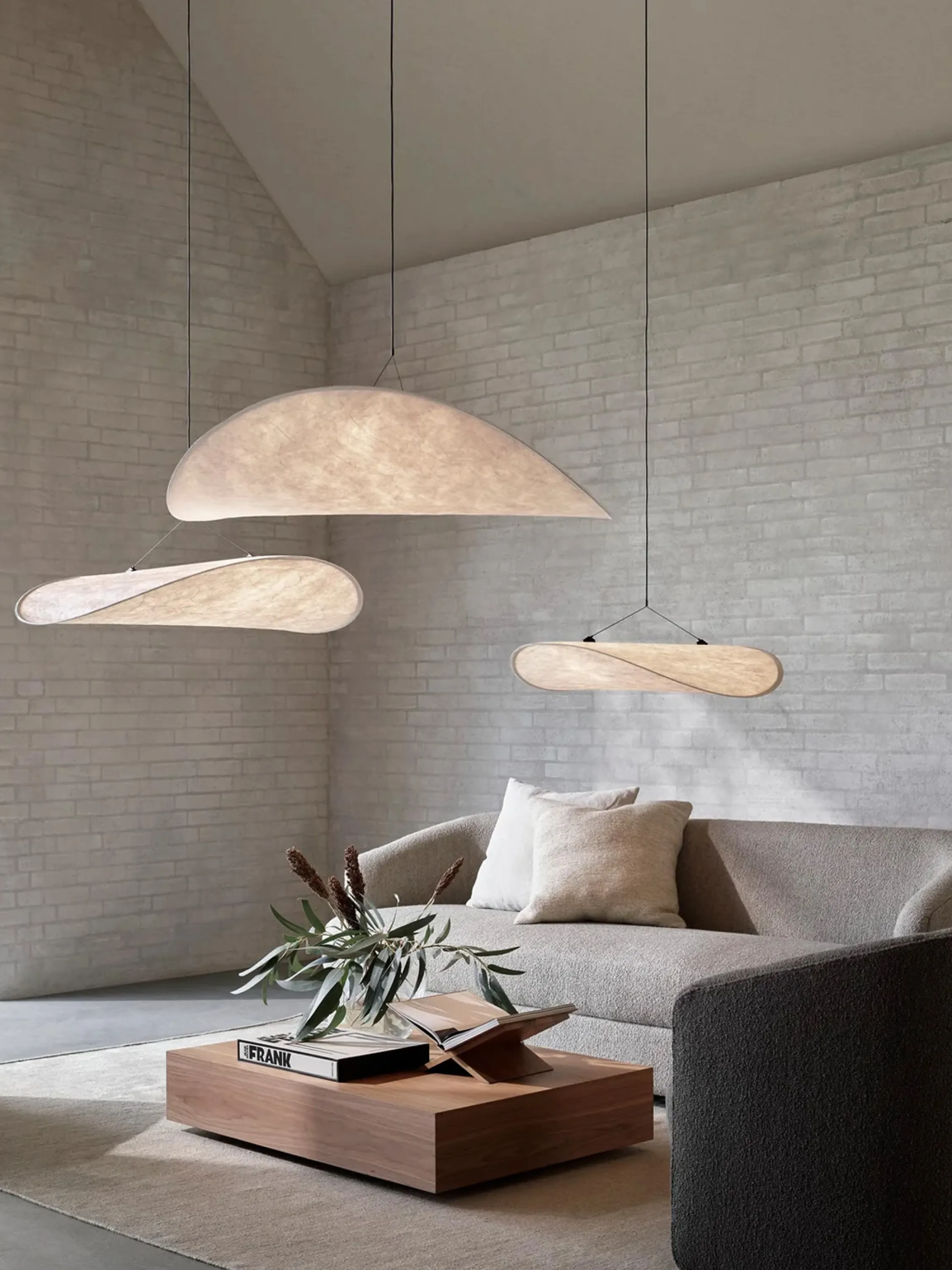 Clustered pendant lamps provodong a soft light.