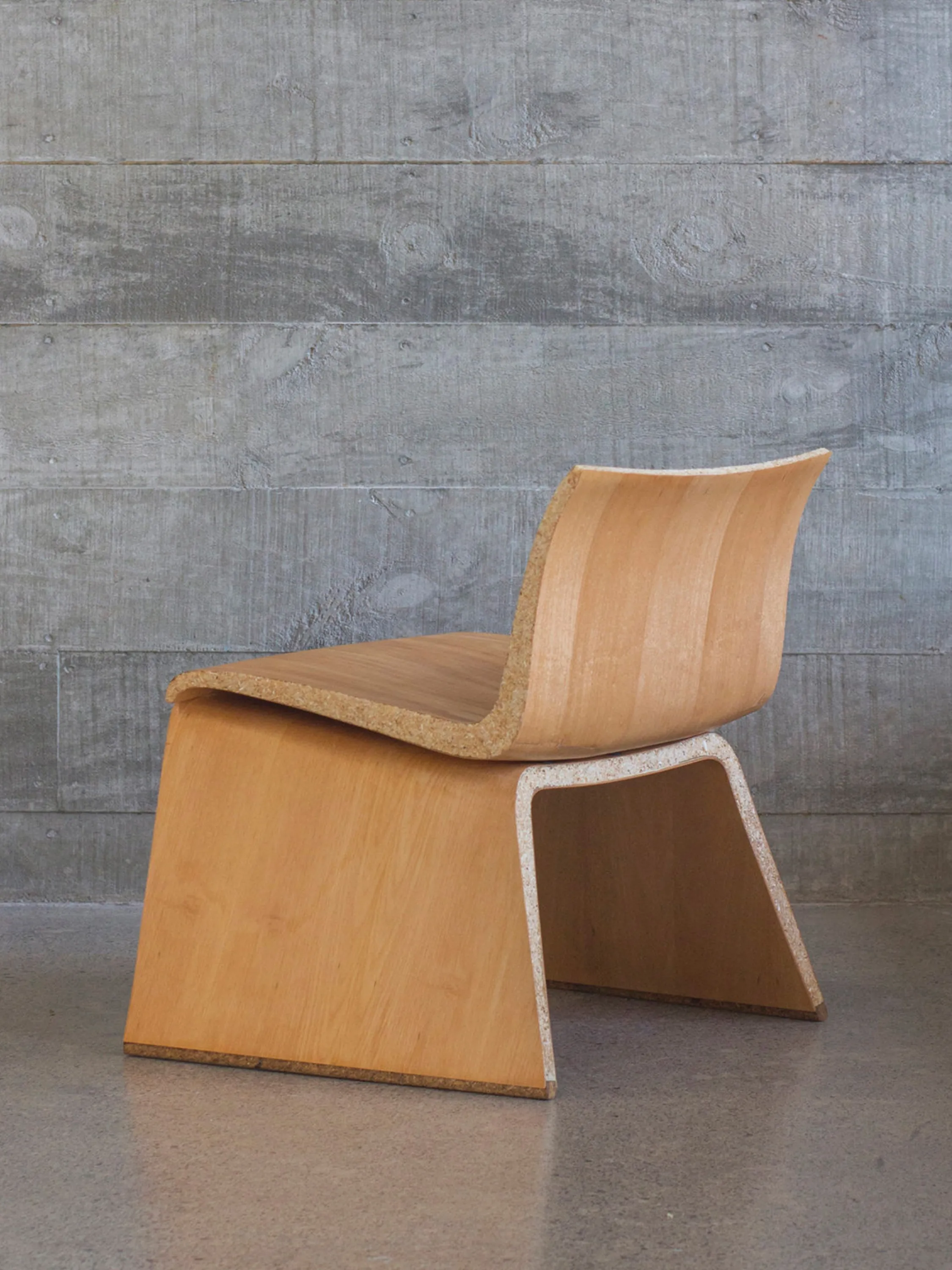 Biofabricated chair that looks like a regular bent-wood chair.