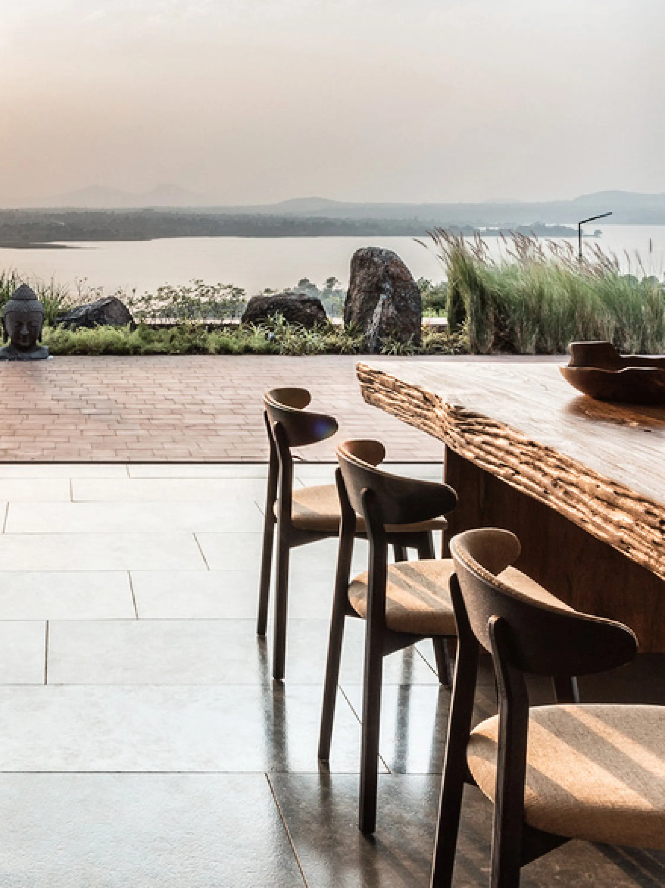 Indoor-outdoor living space overlooking the ocean.