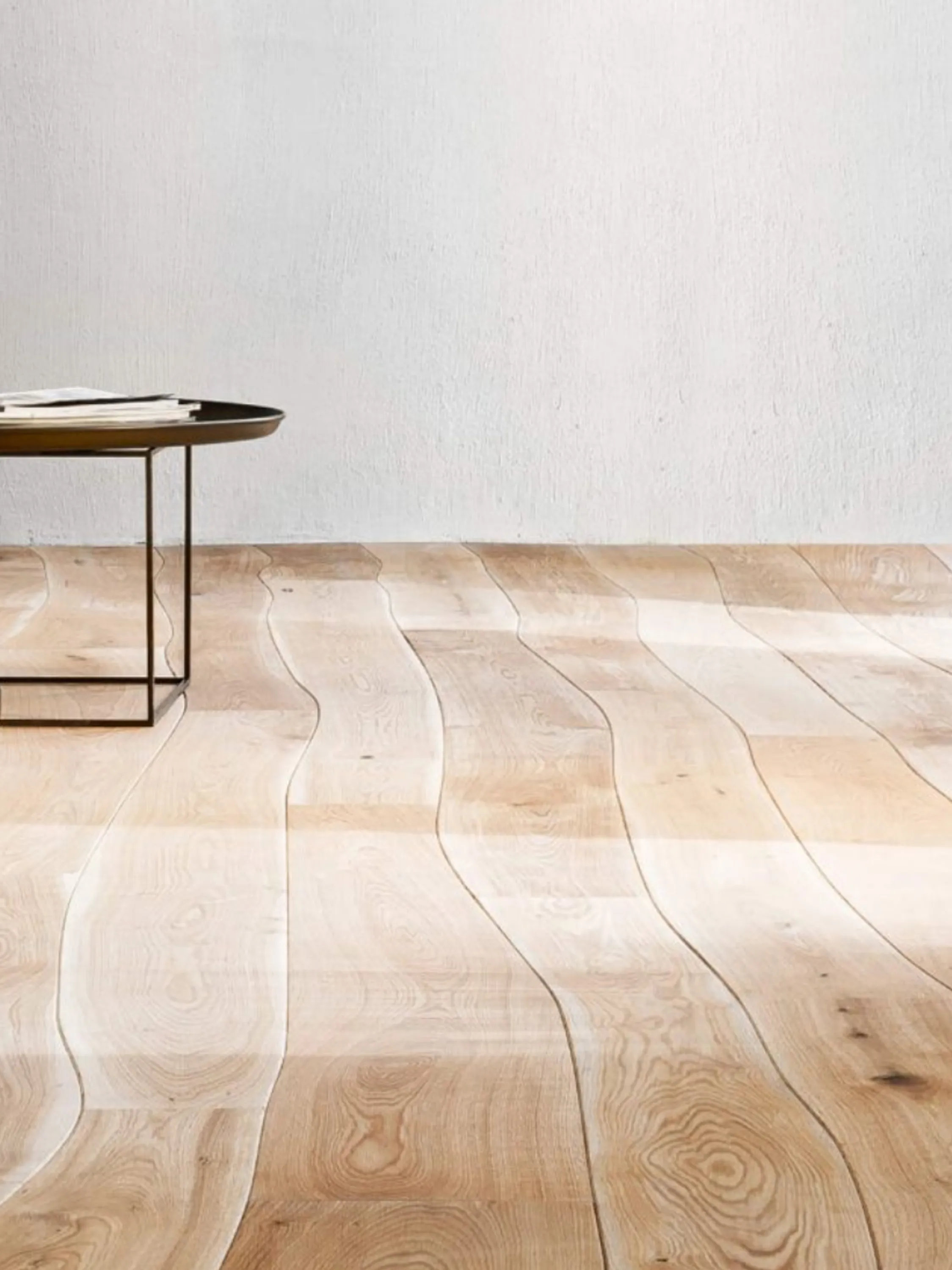 Wood floor with a waste-reducing curved profile.