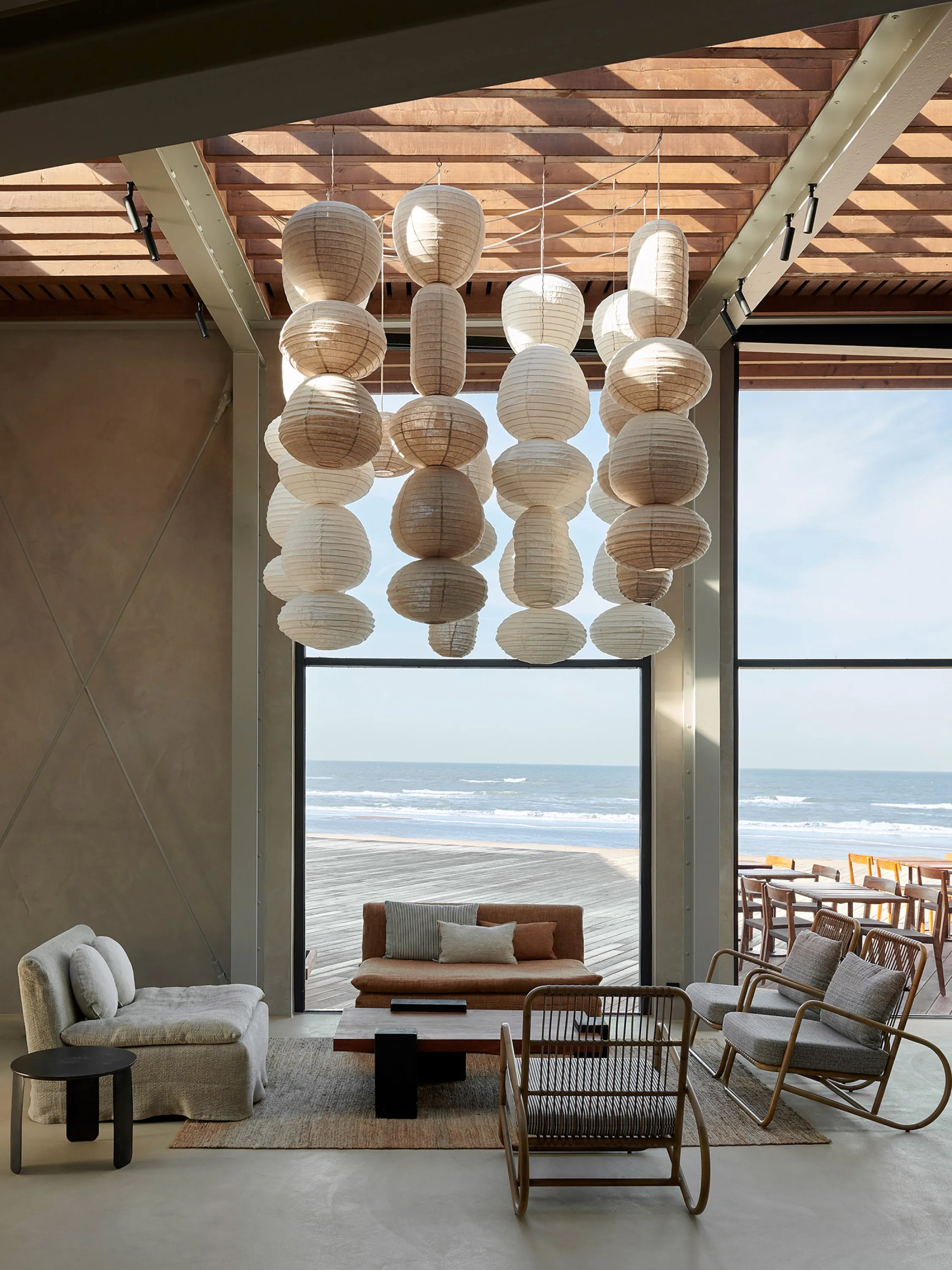 Sitting area whose colour and material palette recalls the surroundings.