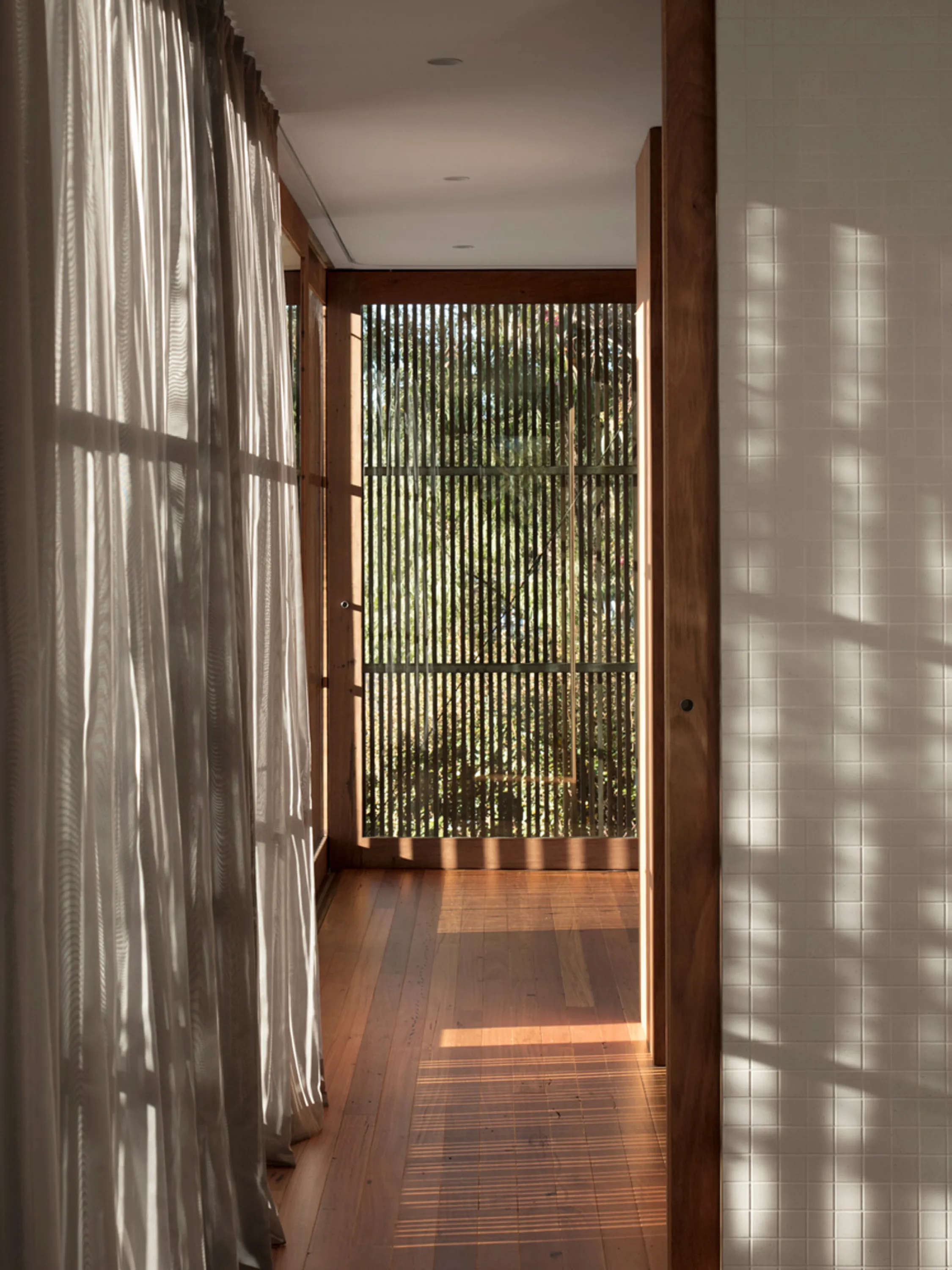 Window with wood shading system.