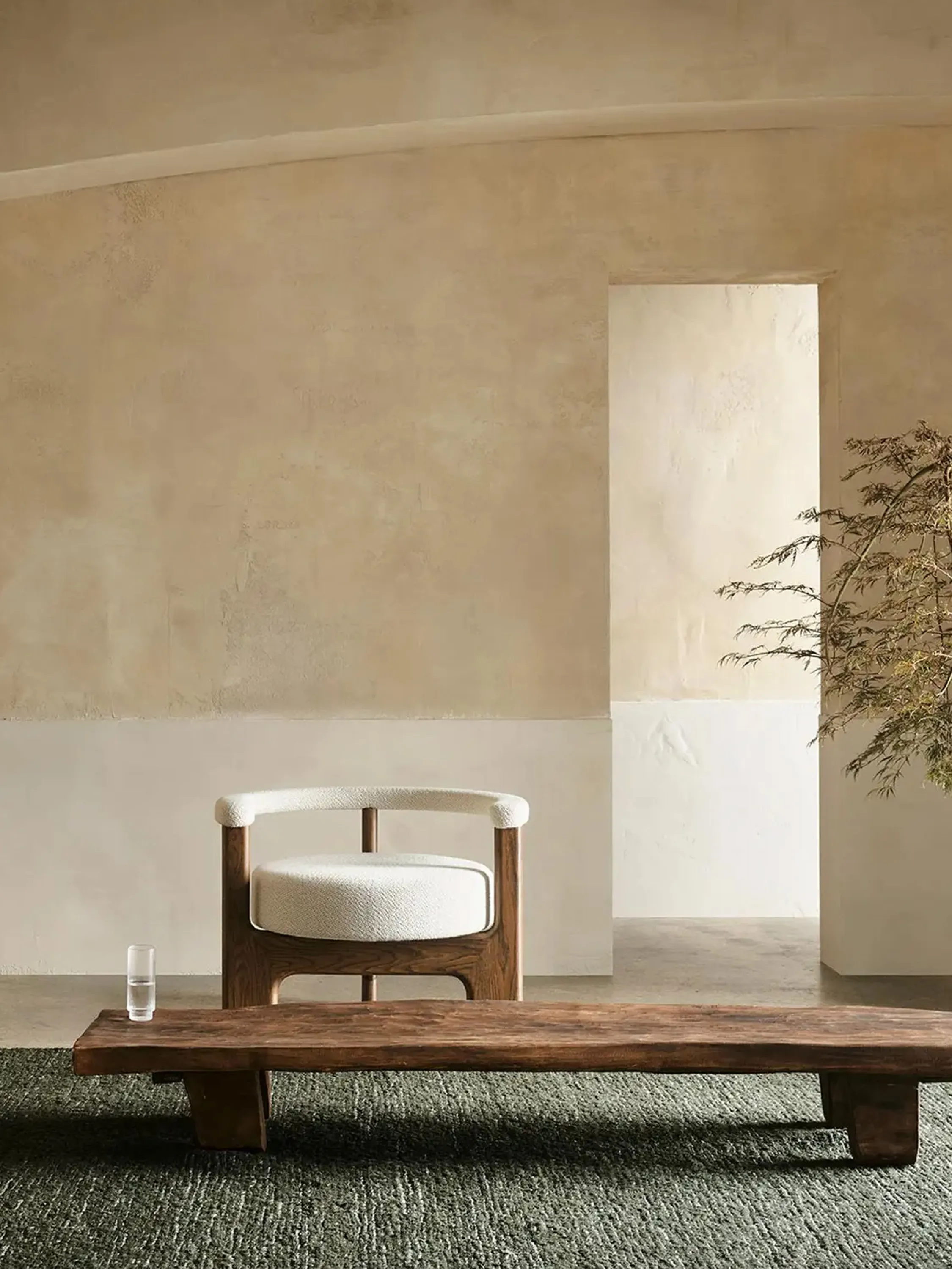 Rug softening the feel of a stone floor.