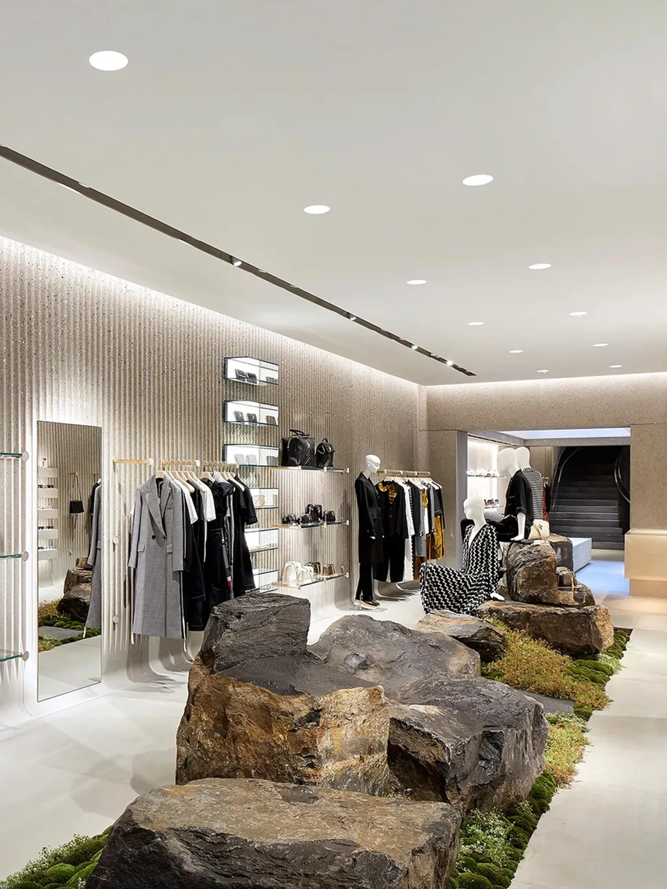 Rocks in the middle of a store create a path that regulates traffic.