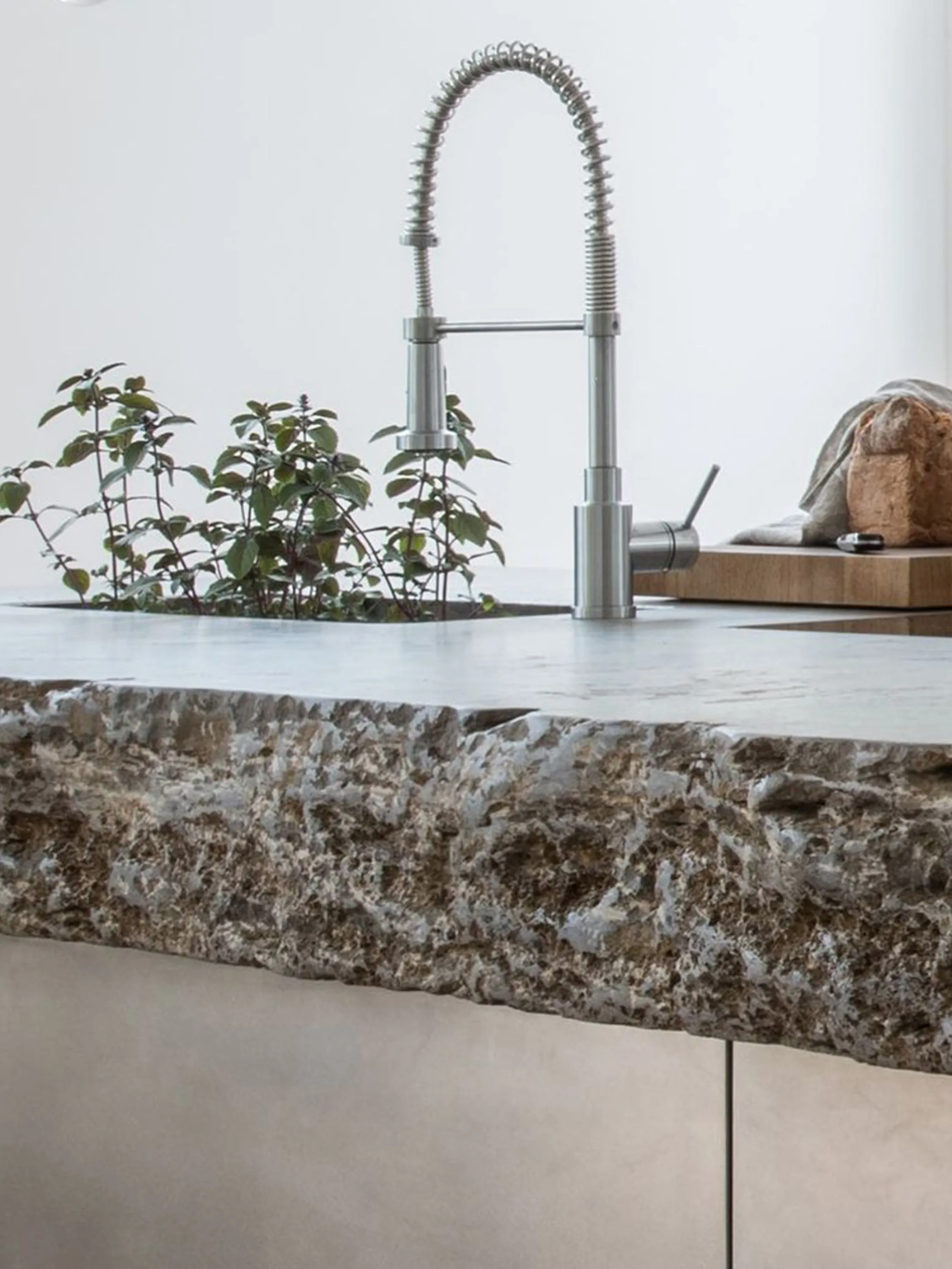 Stone kitchen countertop with textured edge.