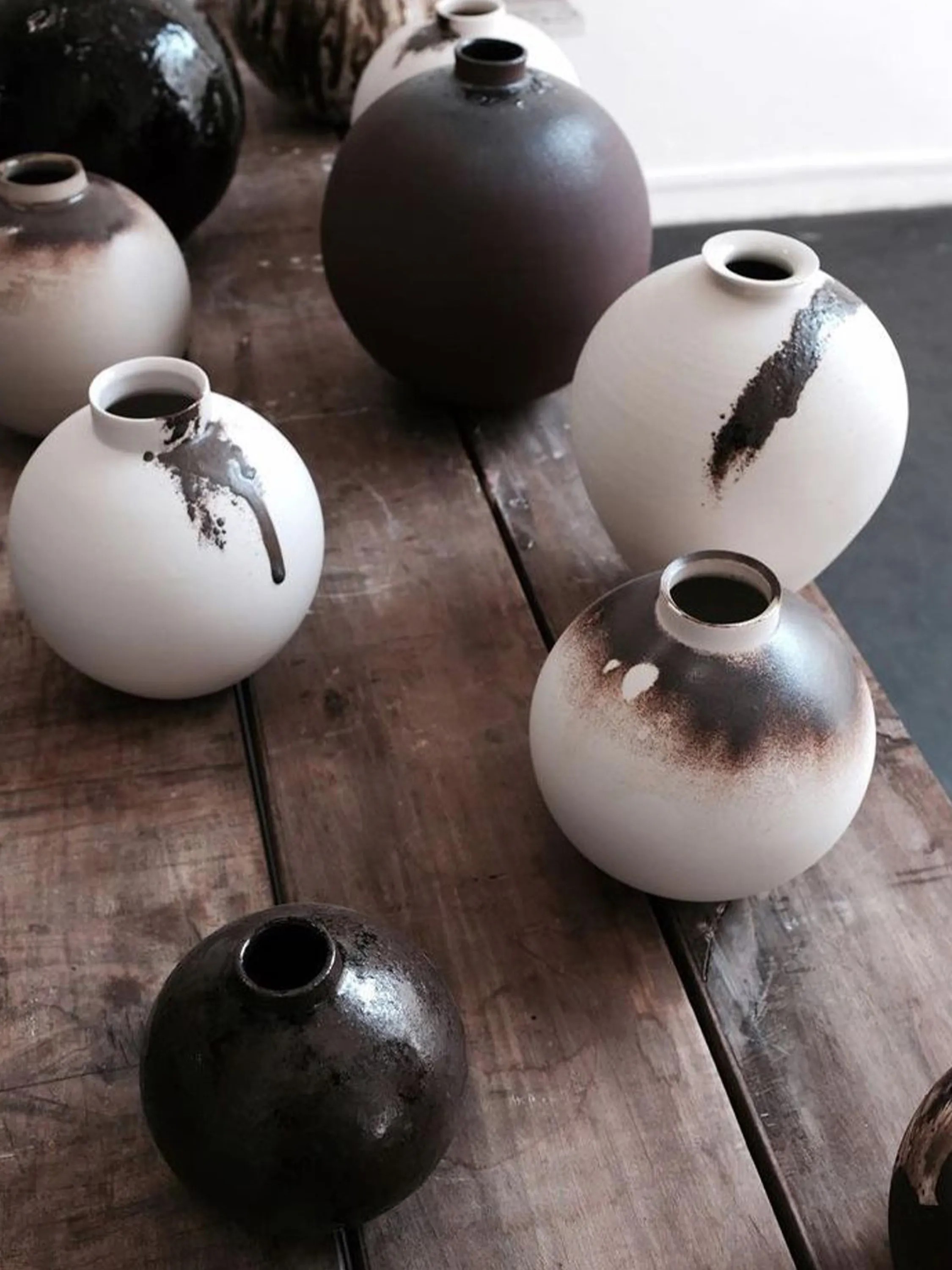 Clay vases on a table.