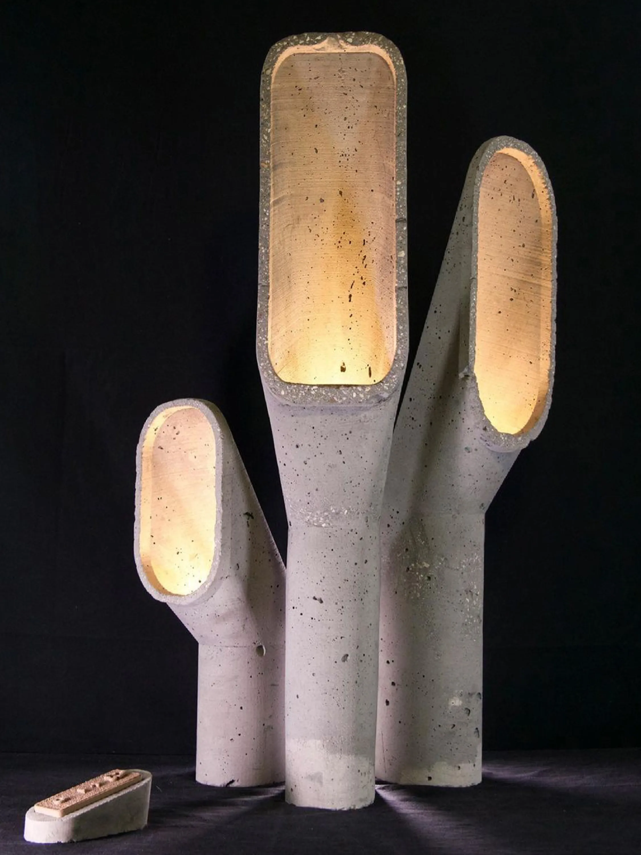 Sculptural concrete lamps.