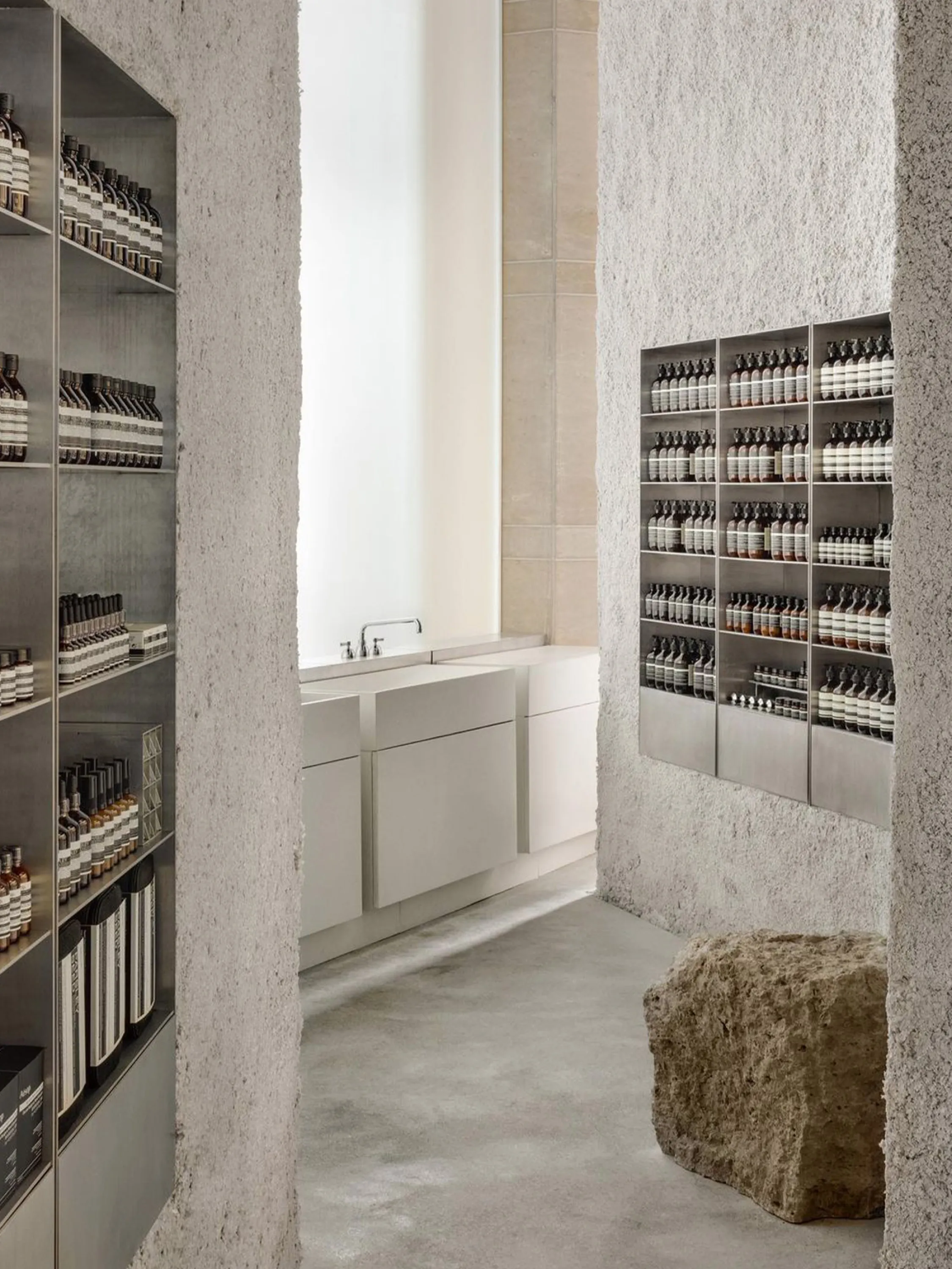 View of the washbasin area, hidden behind curved walls.