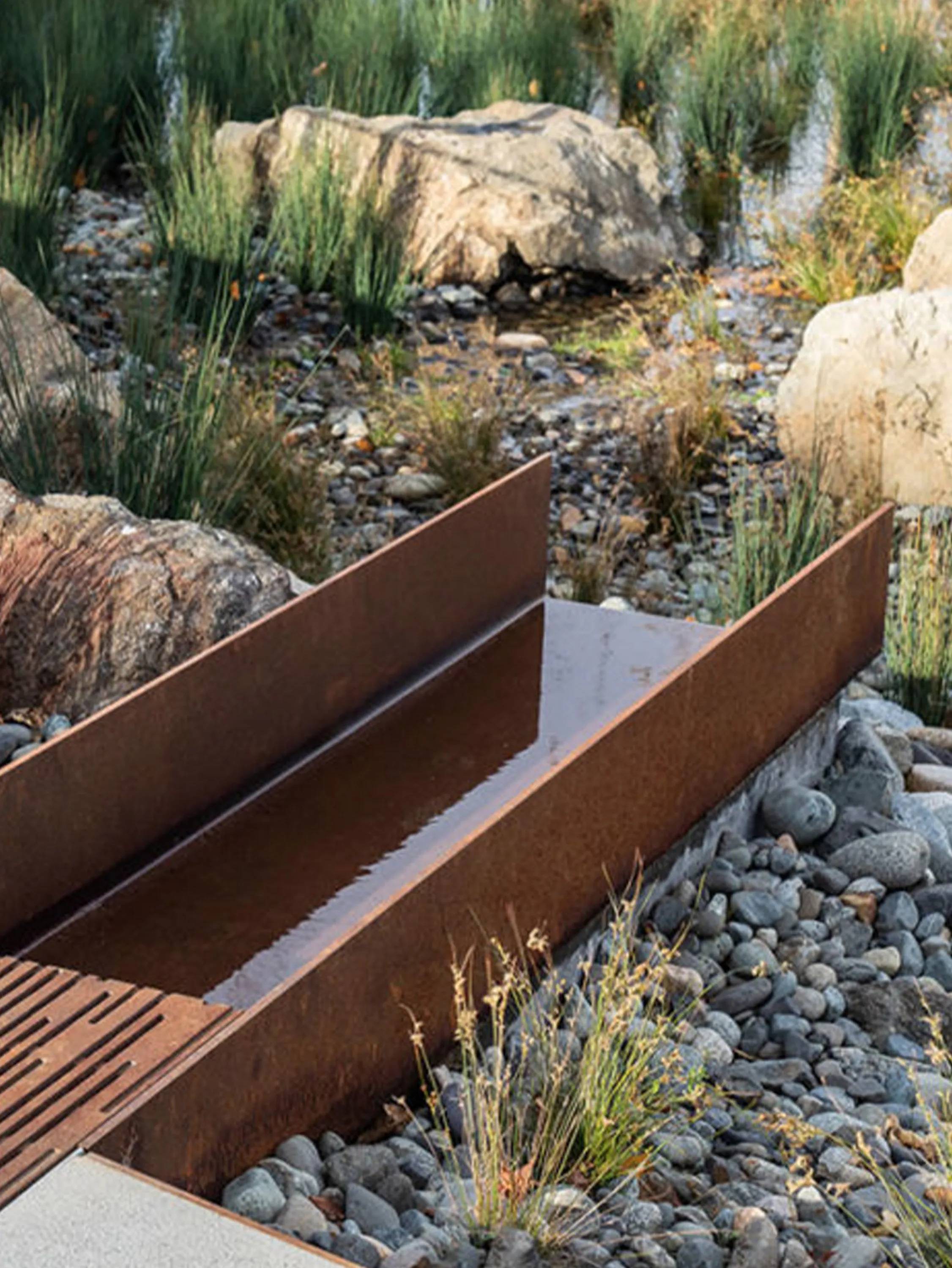 Rainwater flow in a green public area.