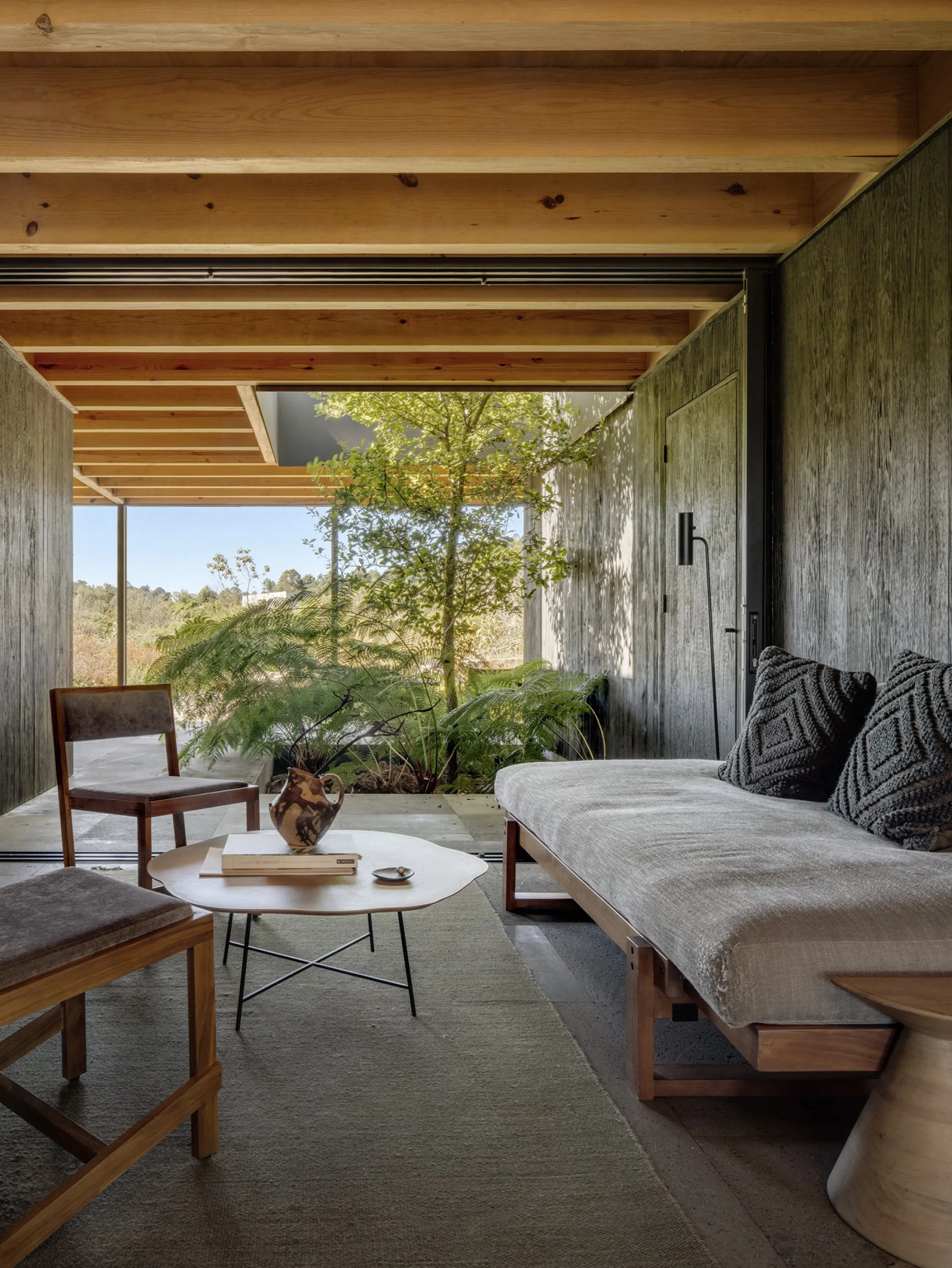 An indoor seating area that opens to the outdoor.