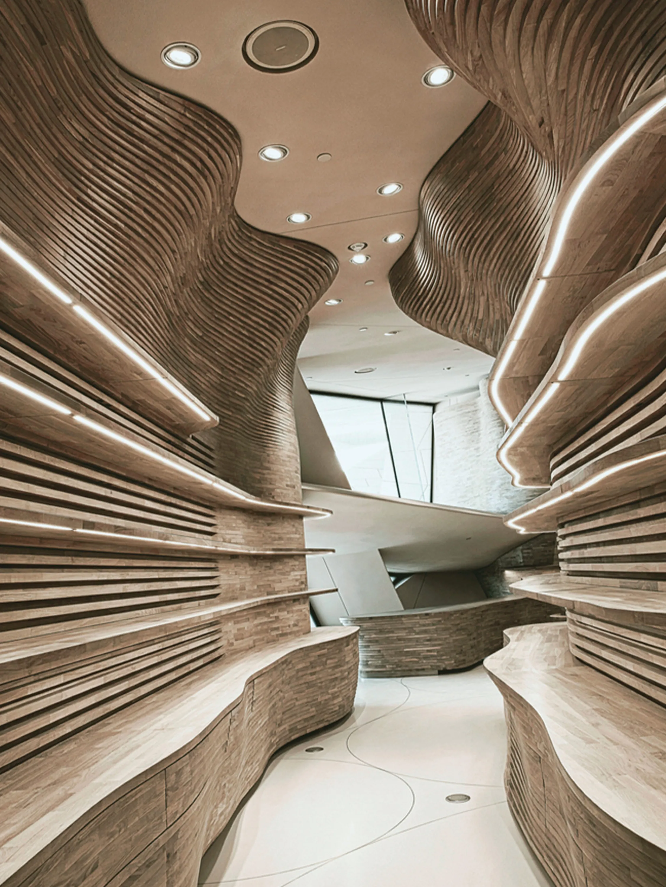 A corridor with a sinuous profile.