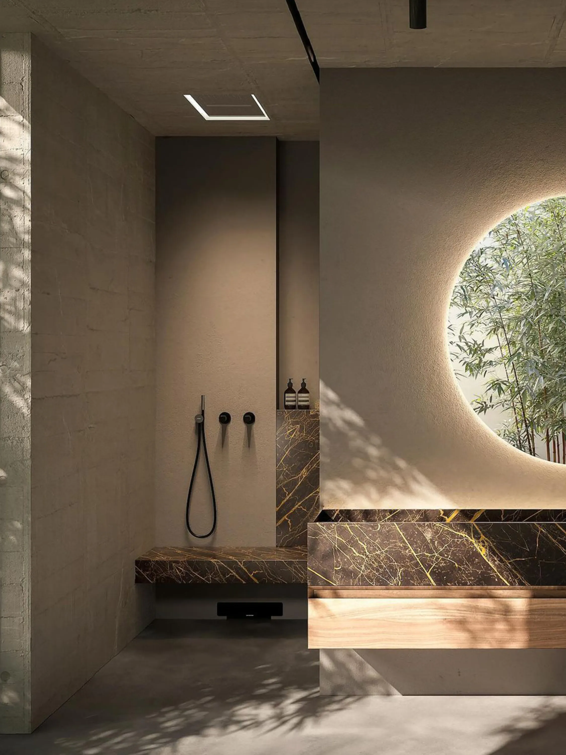 Bathroom with brown marble accents and a view to the outdoors.