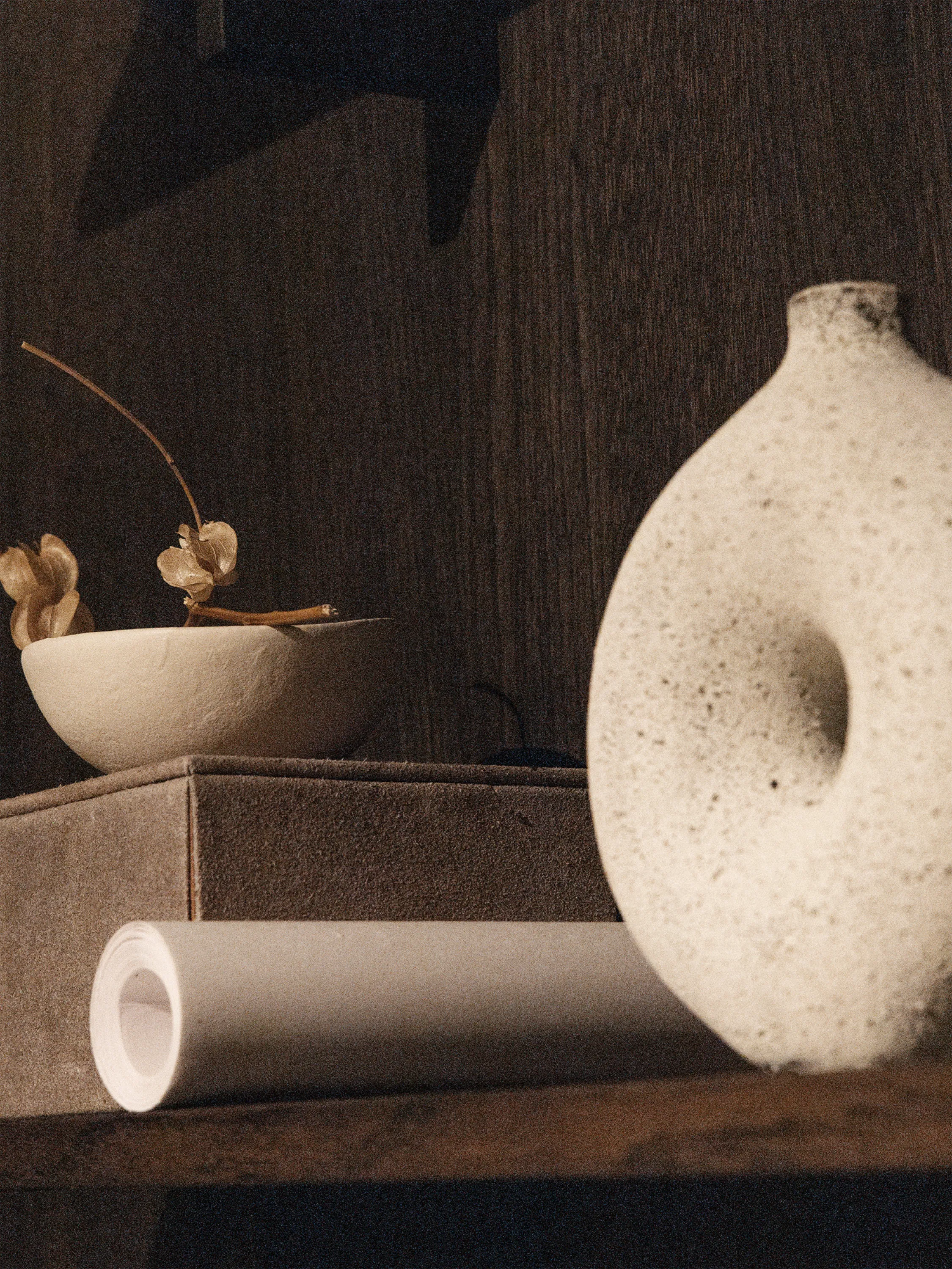 Vignette with tactile accessories in sand tones.