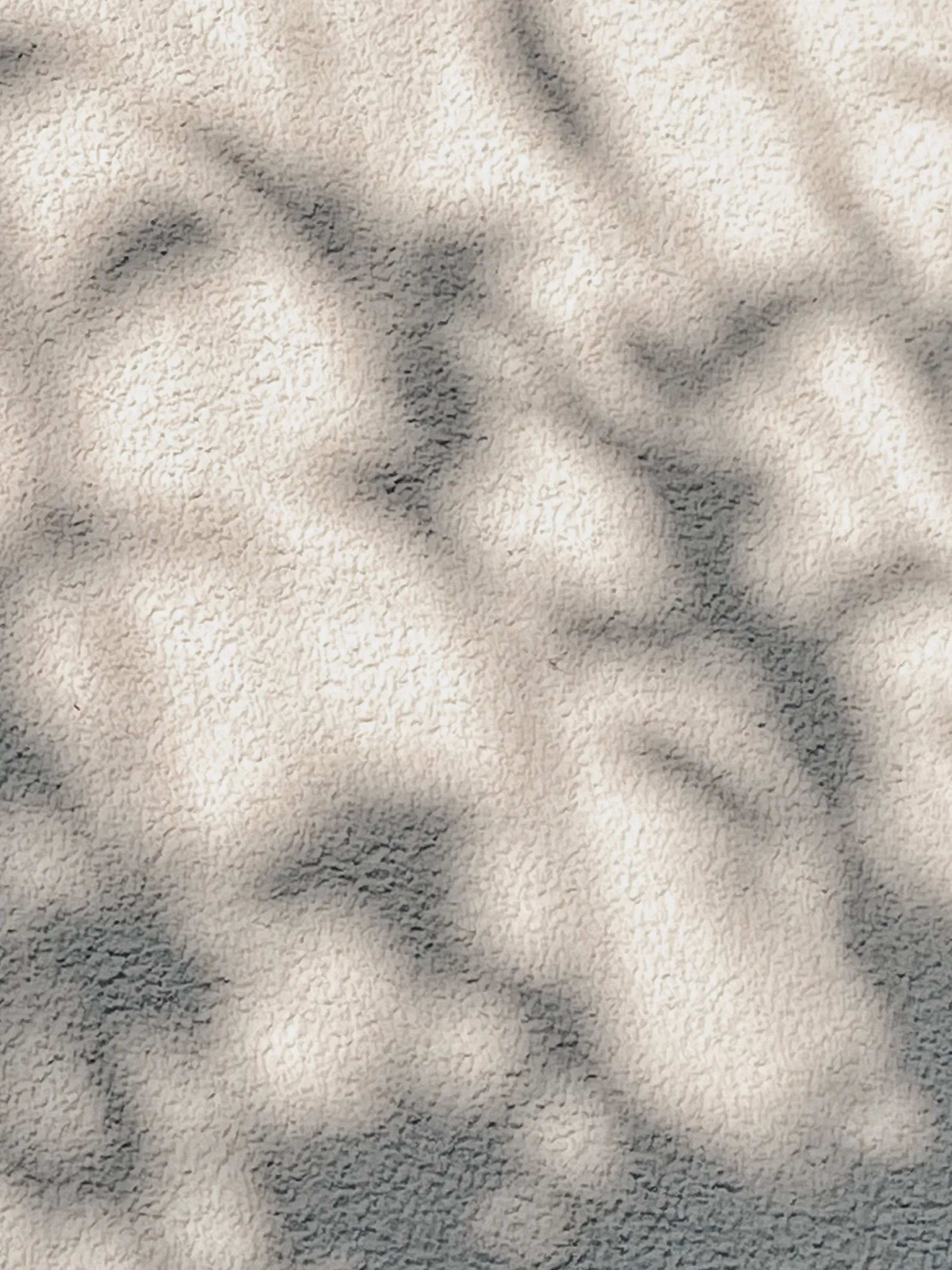 Shadows on a rough wall.