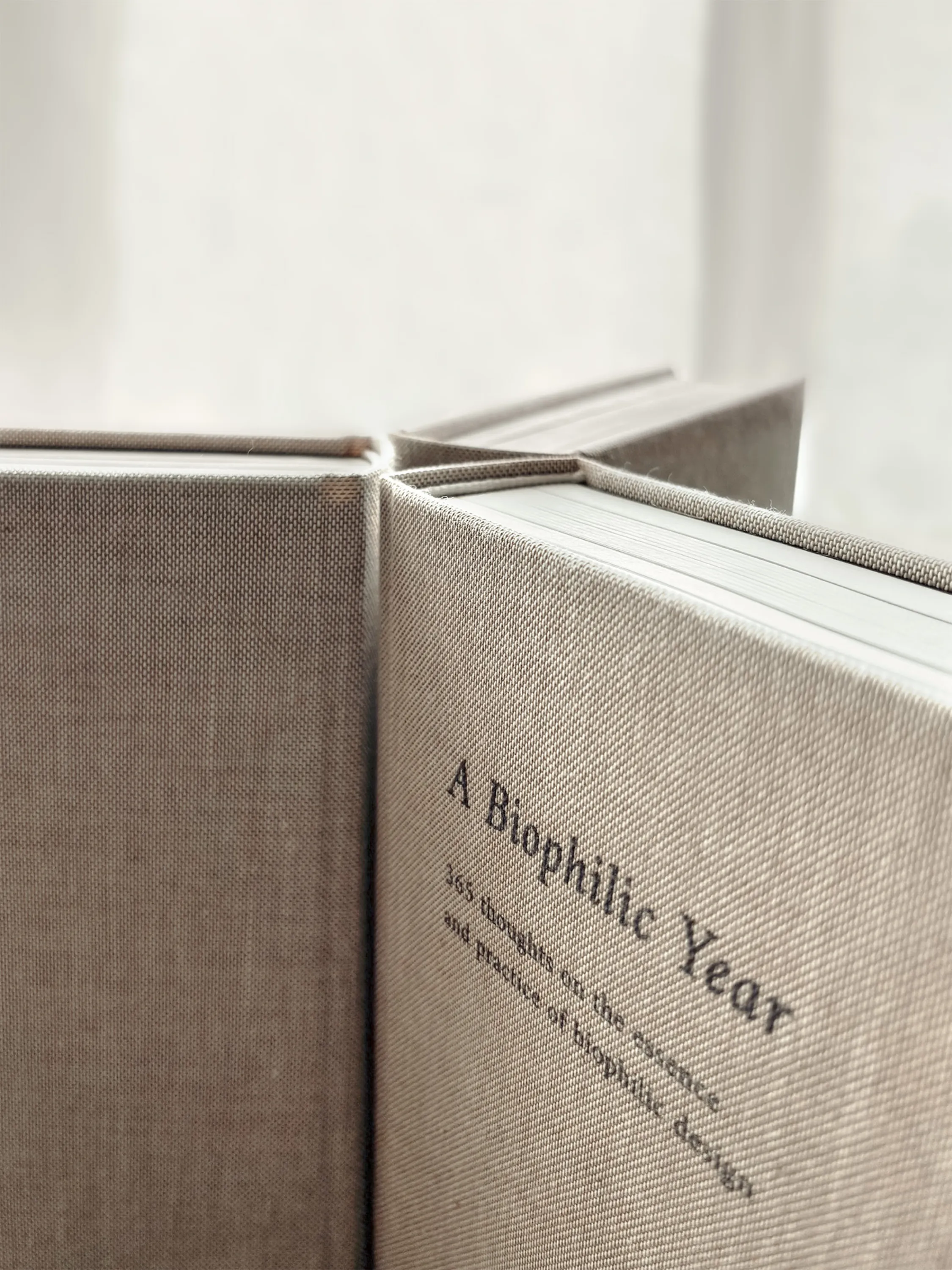 A Biophilic Year books looking at each other.