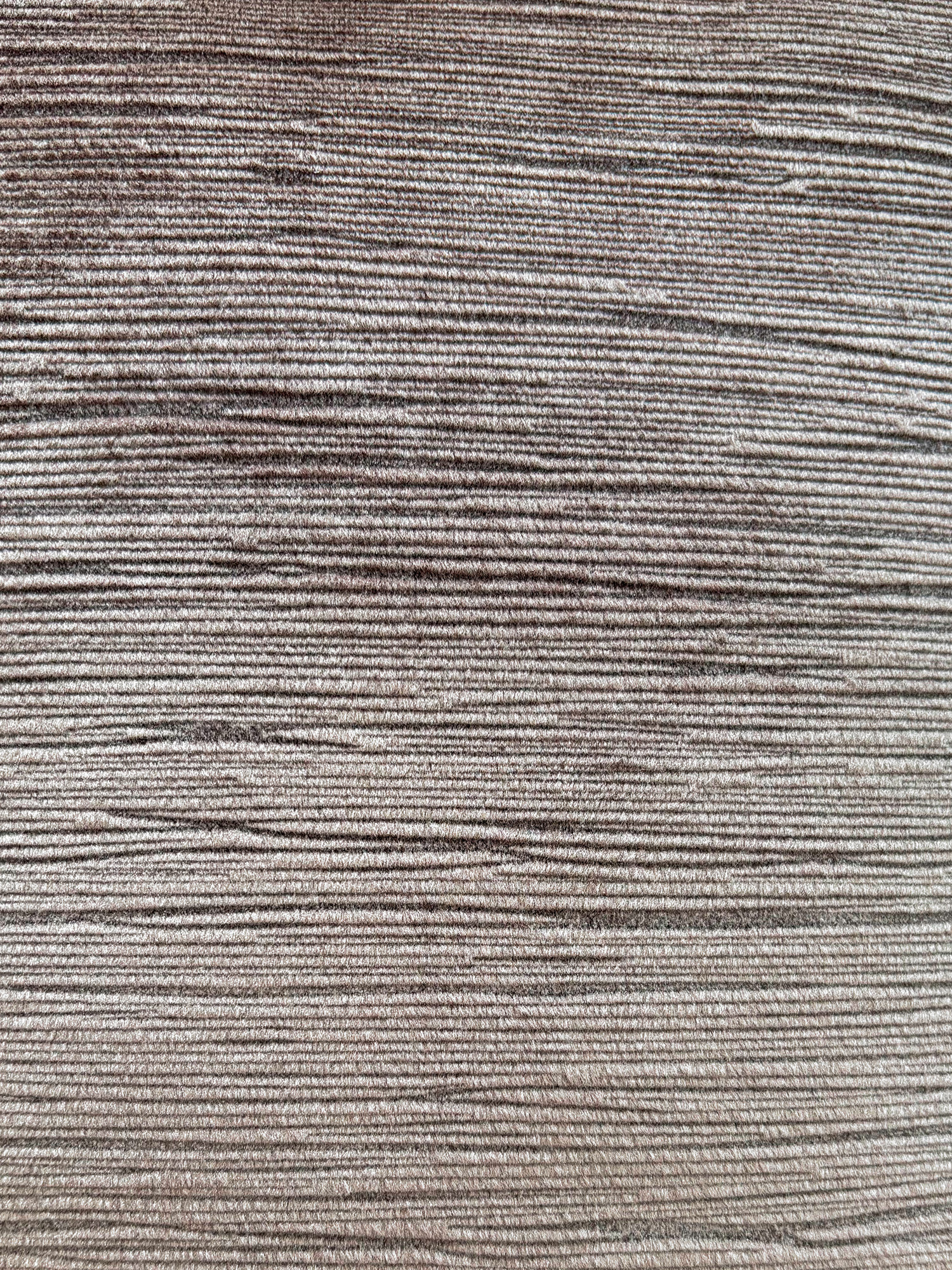 Ribbed corded fabric with a wet-sand sheen
