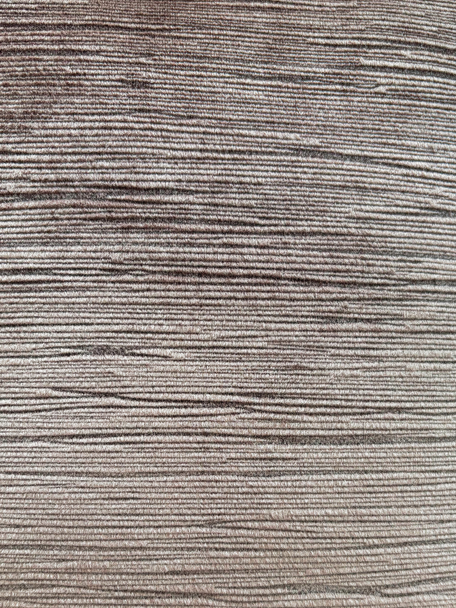 Ribbed corded fabric with a wet-sand sheen